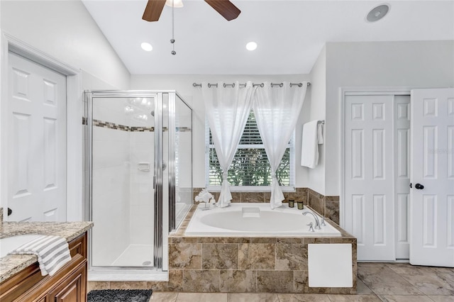805 Woodcarver Ln, Brandon, FL 33510 - bathroom featuring a garden tub, a shower stall, a ceiling fan, and vanity