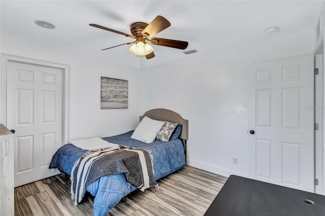 805 Woodcarver Ln, Brandon, FL 33510 - bedroom featuring light wood-type flooring and ceiling fan