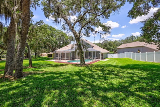 805 Woodcarver Ln, Brandon, FL 33510 - fenced backyard featuring a sunroom