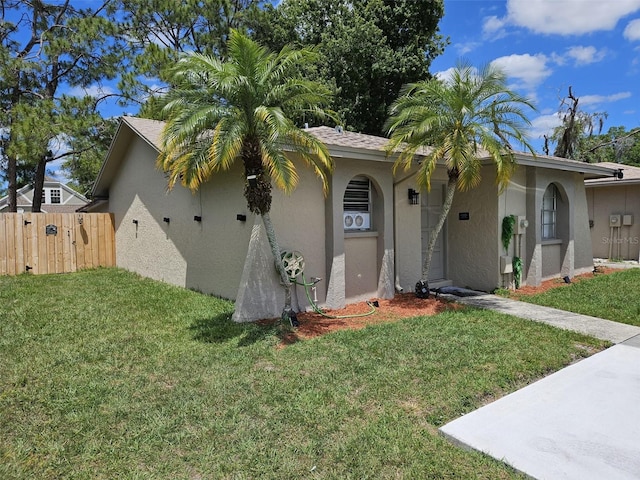 view of front facade with a front lawn