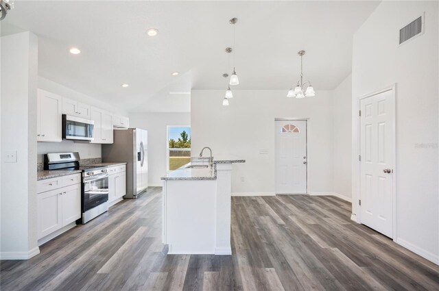 kitchen featuring dark wood-style flooring, a sink, visible vents, white cabinets, and appliances with stainless steel finishes