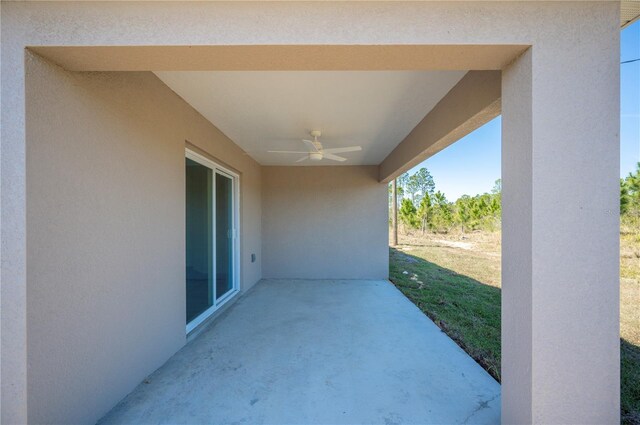 view of patio with ceiling fan