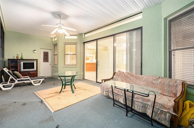 view of patio / terrace featuring ceiling fan