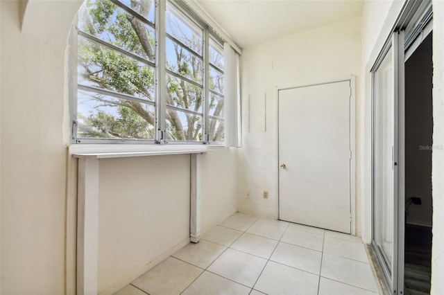 interior space featuring light tile patterned floors