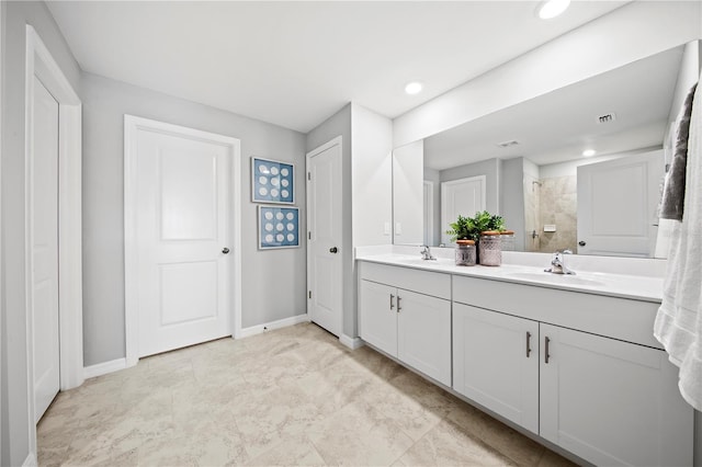 bathroom featuring vanity and walk in shower