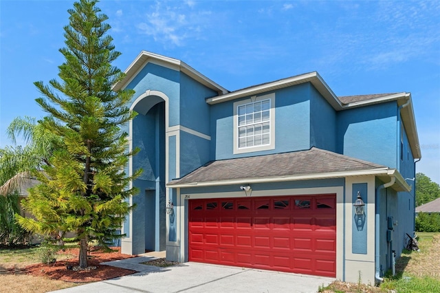 front facade with a garage