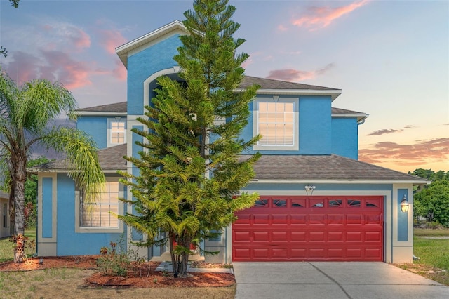 view of front of house with a garage