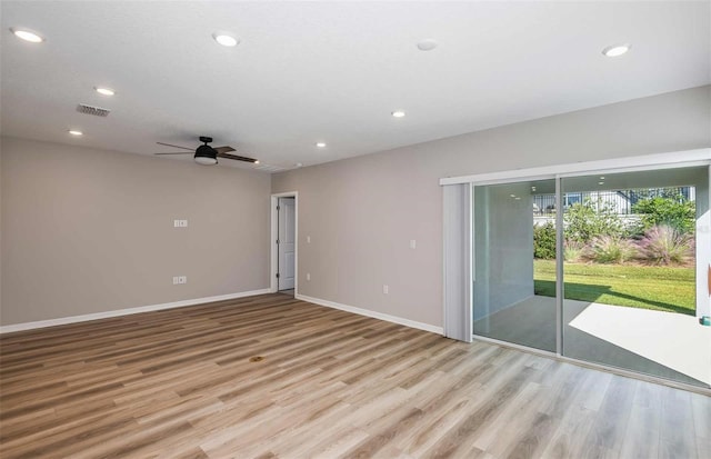 unfurnished room featuring light hardwood / wood-style floors and ceiling fan