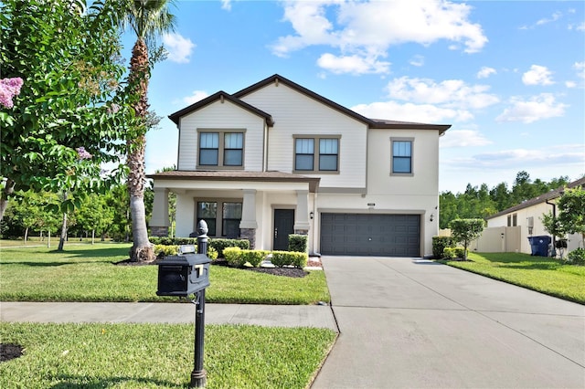 view of front of house featuring a front lawn and a garage