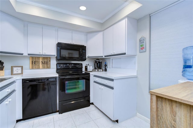 kitchen featuring black appliances, white cabinets, light tile patterned floors, and crown molding