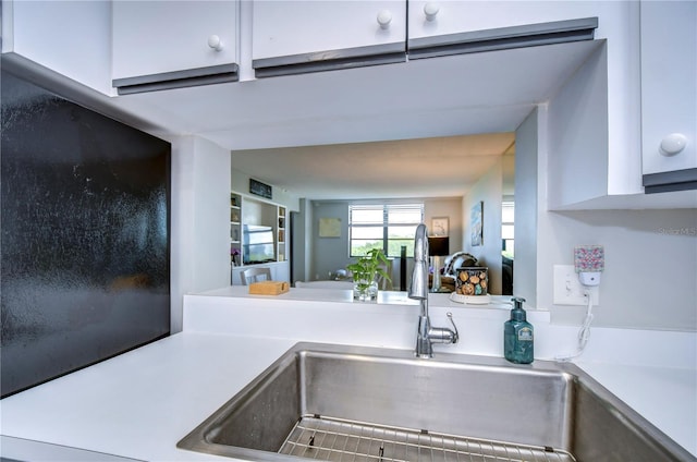 kitchen with white cabinets and sink