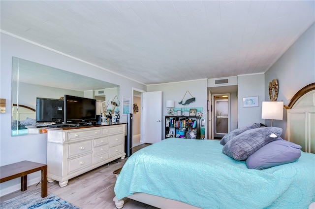 bedroom featuring light hardwood / wood-style floors