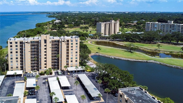 drone / aerial view with a water view