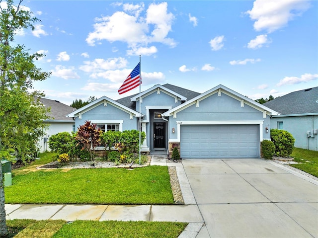 ranch-style home featuring a front yard, a garage, driveway, and stucco siding