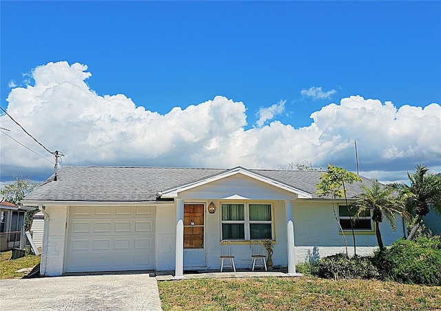 ranch-style home with a garage