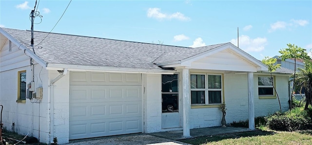 single story home featuring a garage