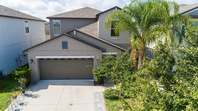 view of front of property with a garage