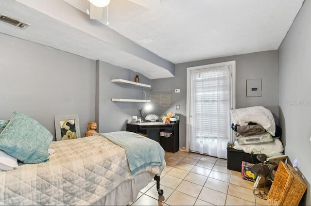 bedroom featuring ceiling fan and light tile patterned floors