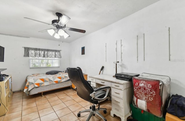 tiled bedroom with ceiling fan