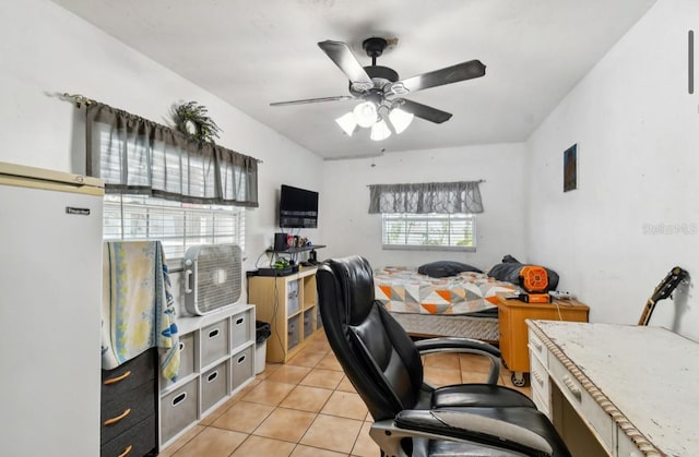 tiled office space with ceiling fan