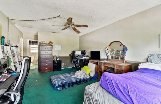 bedroom with ceiling fan, dark carpet, and a textured ceiling