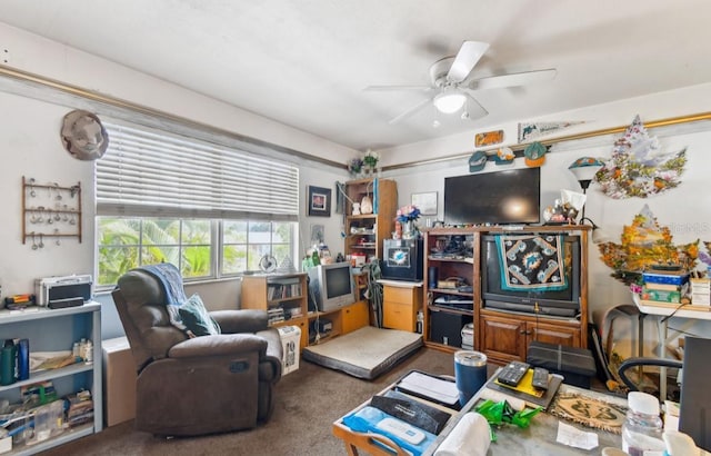 office space with dark carpet and ceiling fan