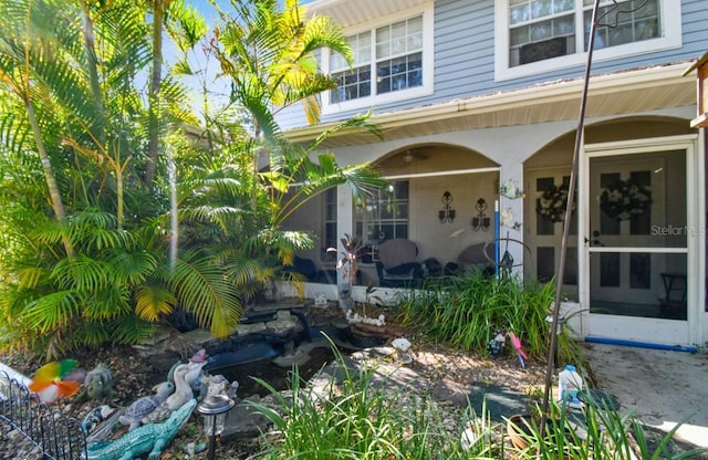 doorway to property with a porch