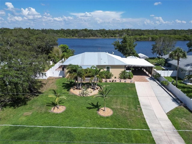 birds eye view of property with a water view