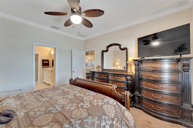 2628 River Bend Dr, Ruskin, FL 33570 - bedroom featuring connected bathroom, ceiling fan, light wood-type flooring, and ornamental molding