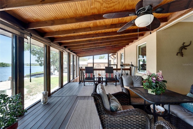2628 River Bend Dr, Ruskin, FL 33570 - sunroom with lofted ceiling with beams and a water view