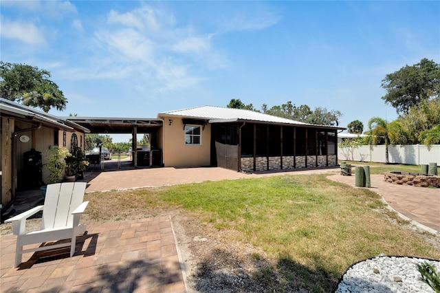 2628 River Bend Dr, Ruskin, FL 33570 - rear view of house with a patio