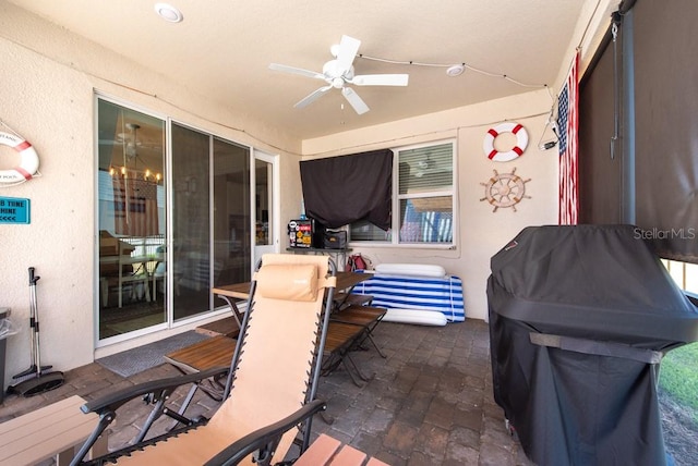 view of patio with ceiling fan