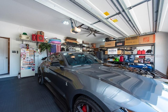 garage featuring a garage door opener and ceiling fan