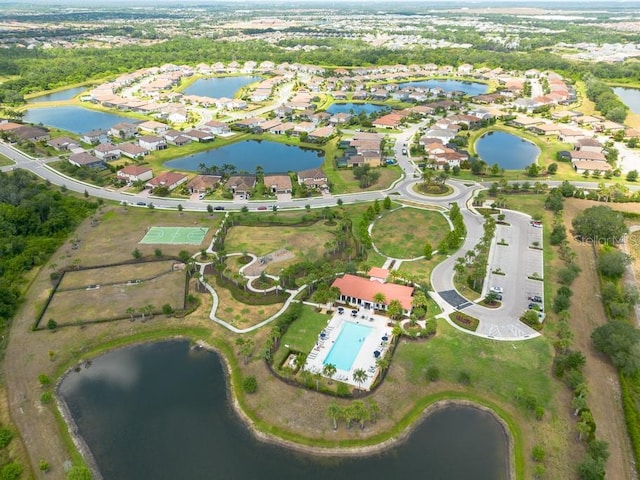 drone / aerial view with a water view