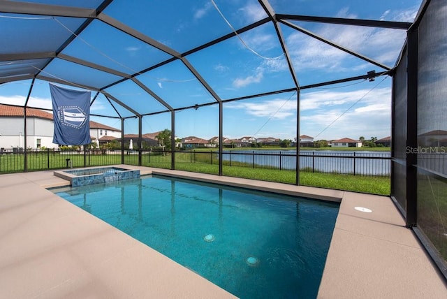 view of pool with a patio area, an in ground hot tub, and a lanai