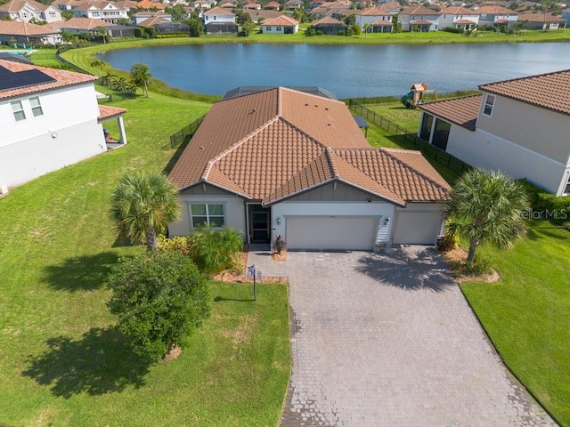 drone / aerial view with a water view