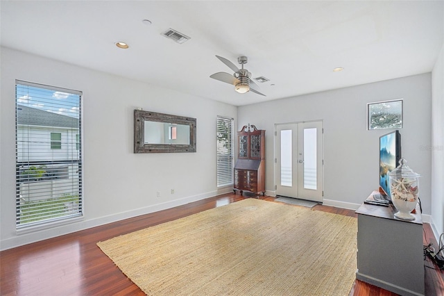 entryway featuring dark hardwood / wood-style flooring, plenty of natural light, french doors, and ceiling fan