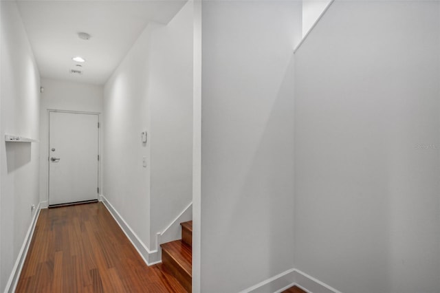 corridor featuring hardwood / wood-style flooring