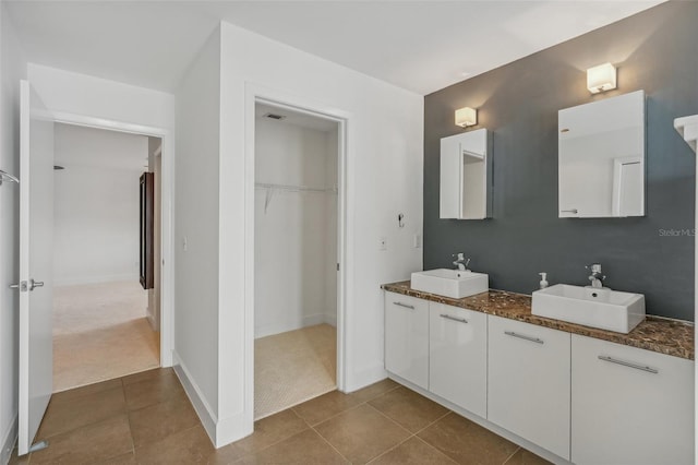 bathroom featuring vanity and tile patterned floors