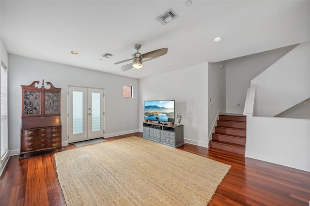 living room featuring dark hardwood / wood-style floors, ceiling fan, and french doors