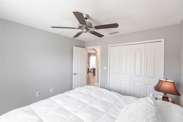 bedroom featuring a closet and ceiling fan