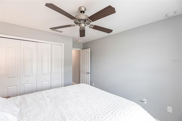 unfurnished bedroom with a closet and ceiling fan