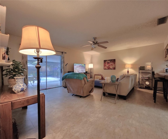 living room with ceiling fan