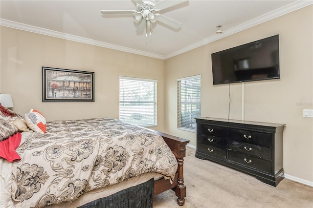 bedroom with baseboards, crown molding, and light colored carpet