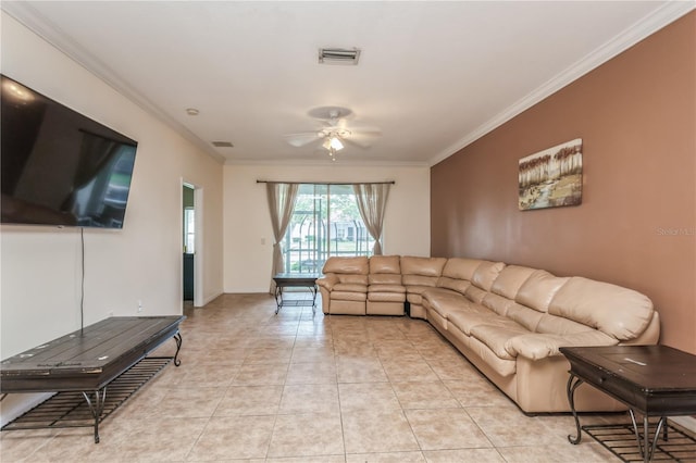 living room with ceiling fan, visible vents, crown molding, and light tile patterned flooring