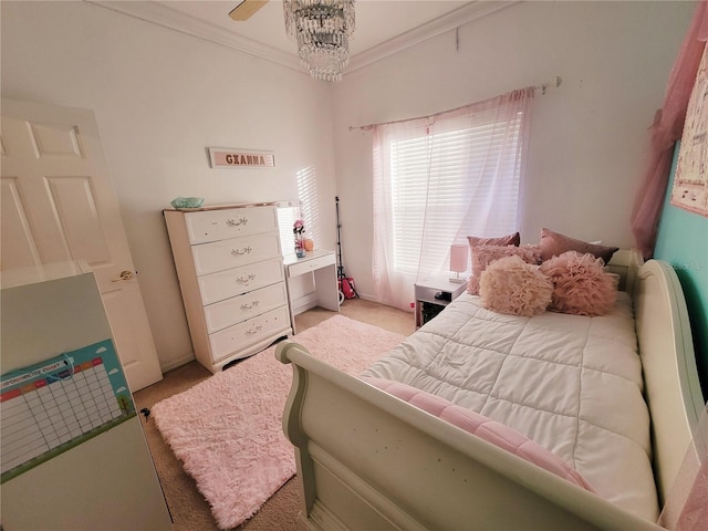 bedroom featuring crown molding and light colored carpet