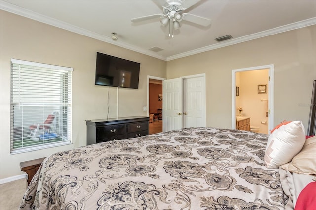 bedroom featuring connected bathroom, light colored carpet, visible vents, and crown molding