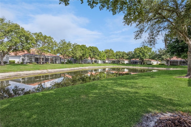 exterior space featuring a residential view and a water view