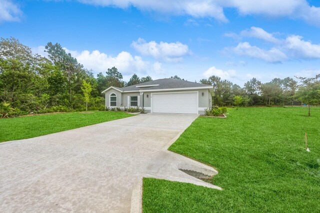 ranch-style house featuring a garage and a front lawn