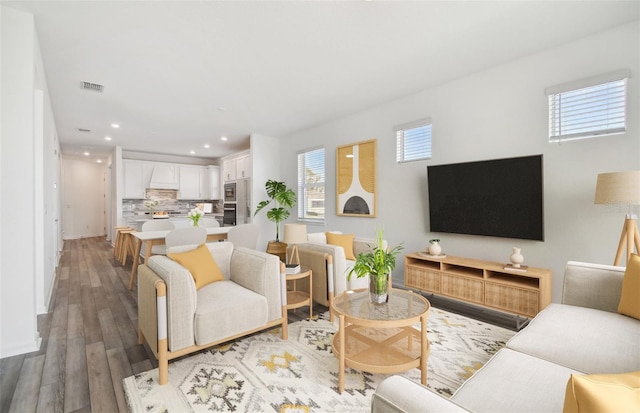 living room with light hardwood / wood-style floors